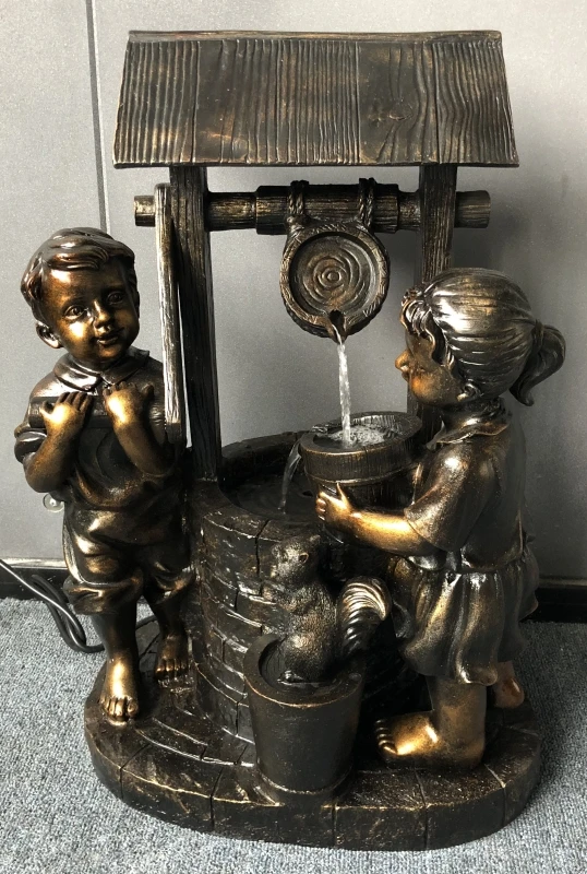 Aventura Kids Playing Fountain With Rustic Well Design And Pump