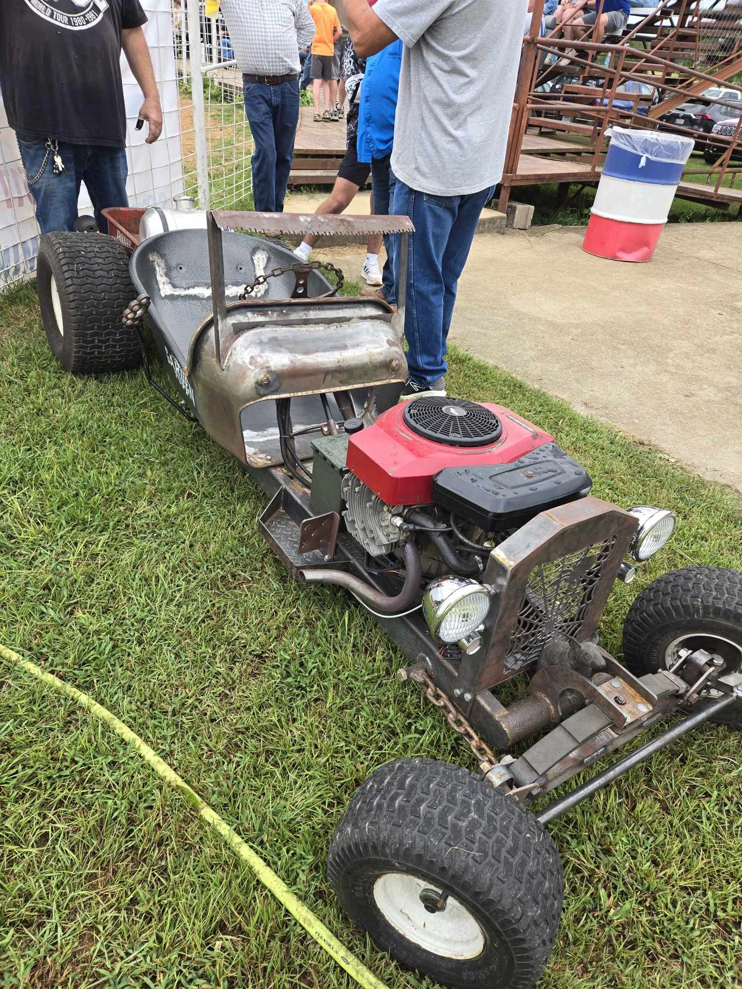 Amazing what you can do with lawn mower parts and a welder! Once he refines his design, we may have to add drag races to our event!